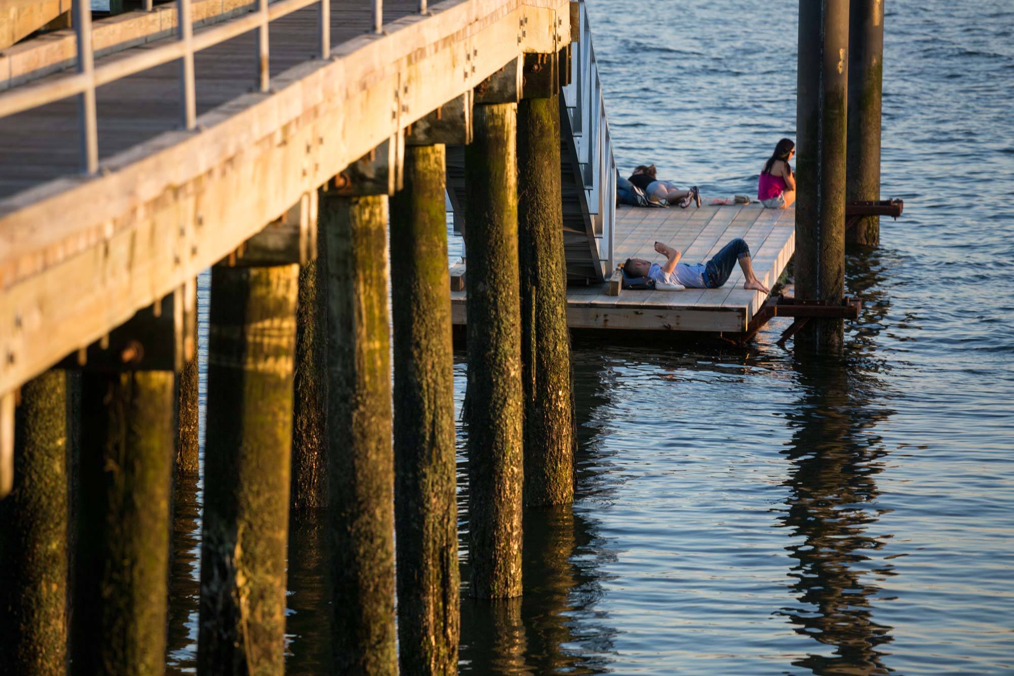 People lounging on docks